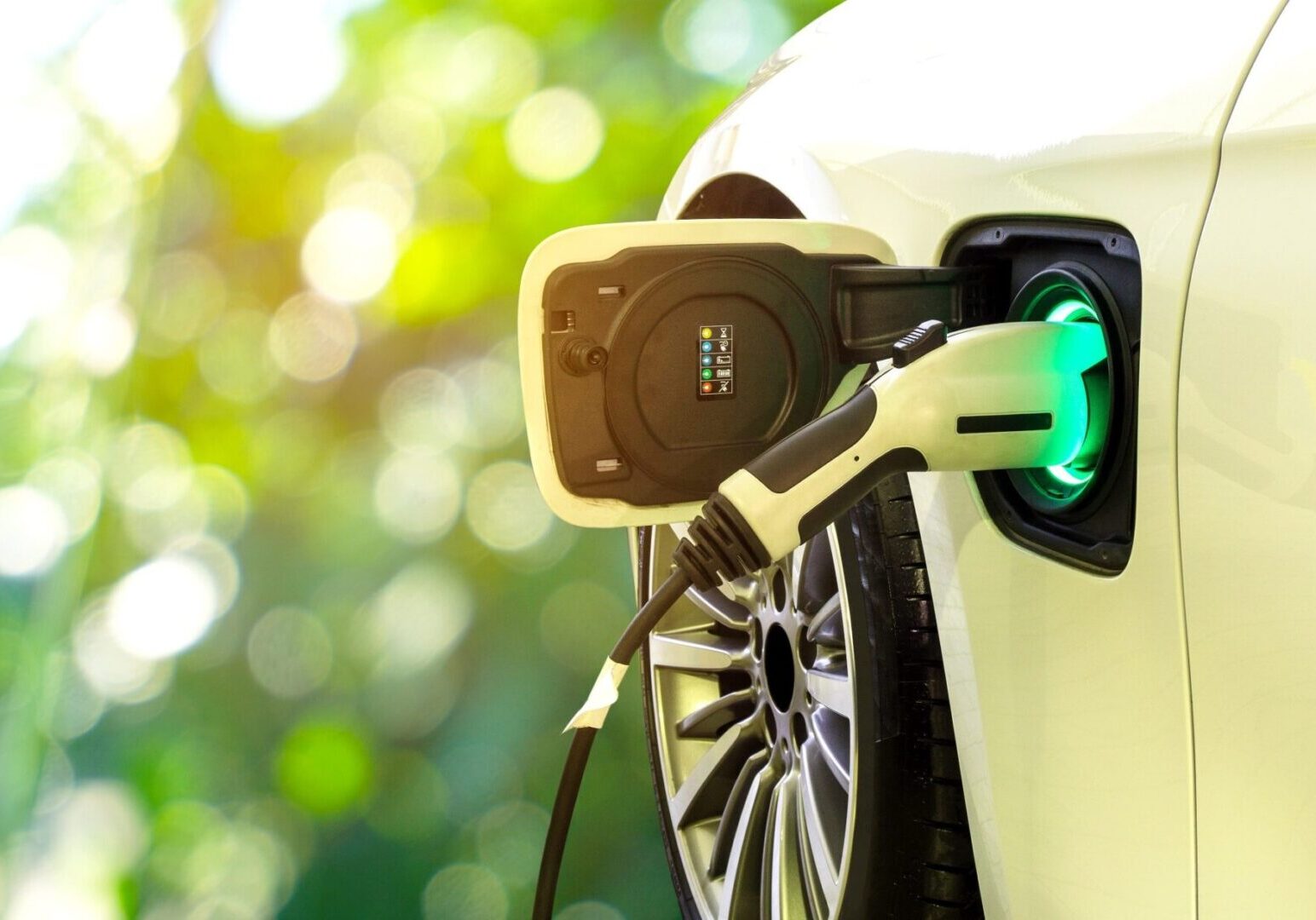A close up of an electric car charging